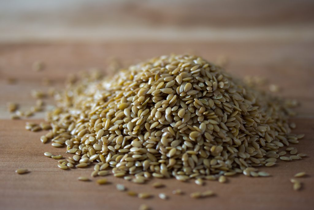 A pile of golden flax seeds